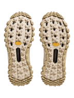 FREUDENHAUS Obertauern Moncler Trailgrip Apex Craft GTX sneakers showing the beige Vibram MEGAGRIP lugged outsoles.